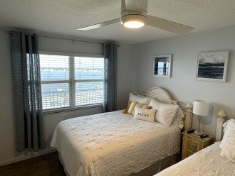 Guest bedroom with two Full mattresses facing bayside