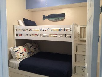 Full size bed on bottom bunk.