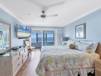 Primary bedroom with full beach views and a private full bathroom.