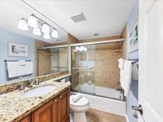 Sparkling clean front bedroom. Bright full sized bathroom with a tub & shower.