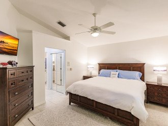 Master bedroom with king size bed and walkin closet