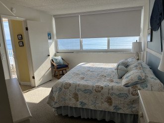 The master bedroom is so close to the ocean it will lull you to sleep