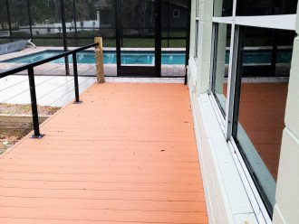 Deck from pool to screened room