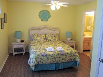 Secondary bedroom queen bed and nightstands