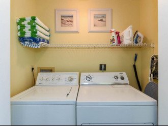 Washer/dryer upstairs between bedroom suites
