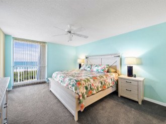 Wake up on king bed to view of ocean through sliders to balcony.