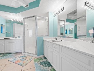 Spacious master ensuite with separate sinks. Large walk-in shower.