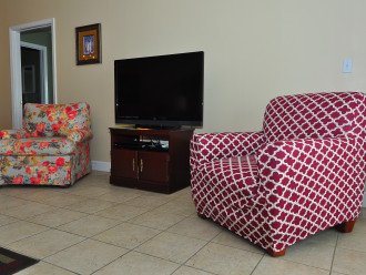Comfy chairs and 42" Smart TV in the living room