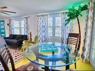 Florida room, table for dining, puzzles or games