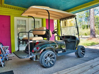 Covered parking for a car or golf cart. Bring your own golf cart or rent ours.