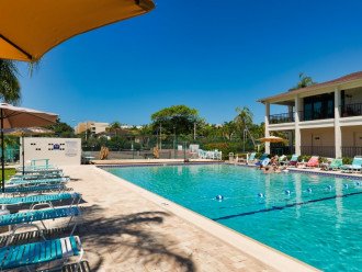 Splash Around - A large heated pool with sundeck and a clubhouse for guests