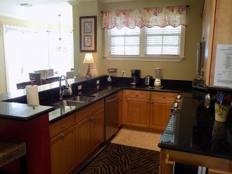 Fully stocked Kitchen with dbl sink, DW, garbage disposal, stove and micro
