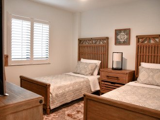 Guest bedroom with two twin beds and new Nectar mattresses.