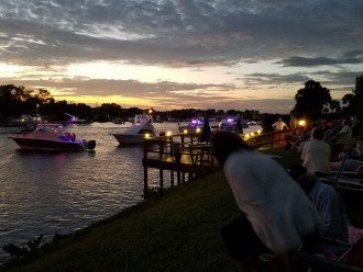 Enjoy the boat parade from property dock.
