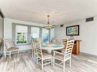 Dining area for 10, with the addition of the kitchen bar space, you can easily seat 12 for a family meal!