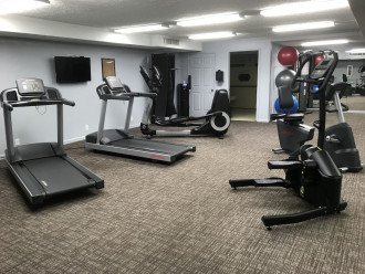 Workout area with bath and water cooler