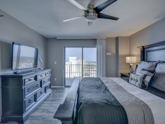 Master bedroom with balcony entrance, king size bed