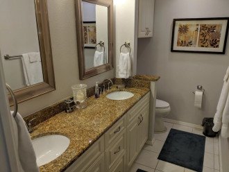 Double sinks and granite in the big master bath, the raised toilet is nice