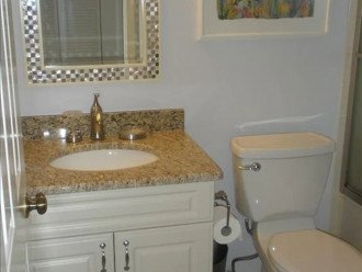 Totally updated guest bathroom with tub/shower combination