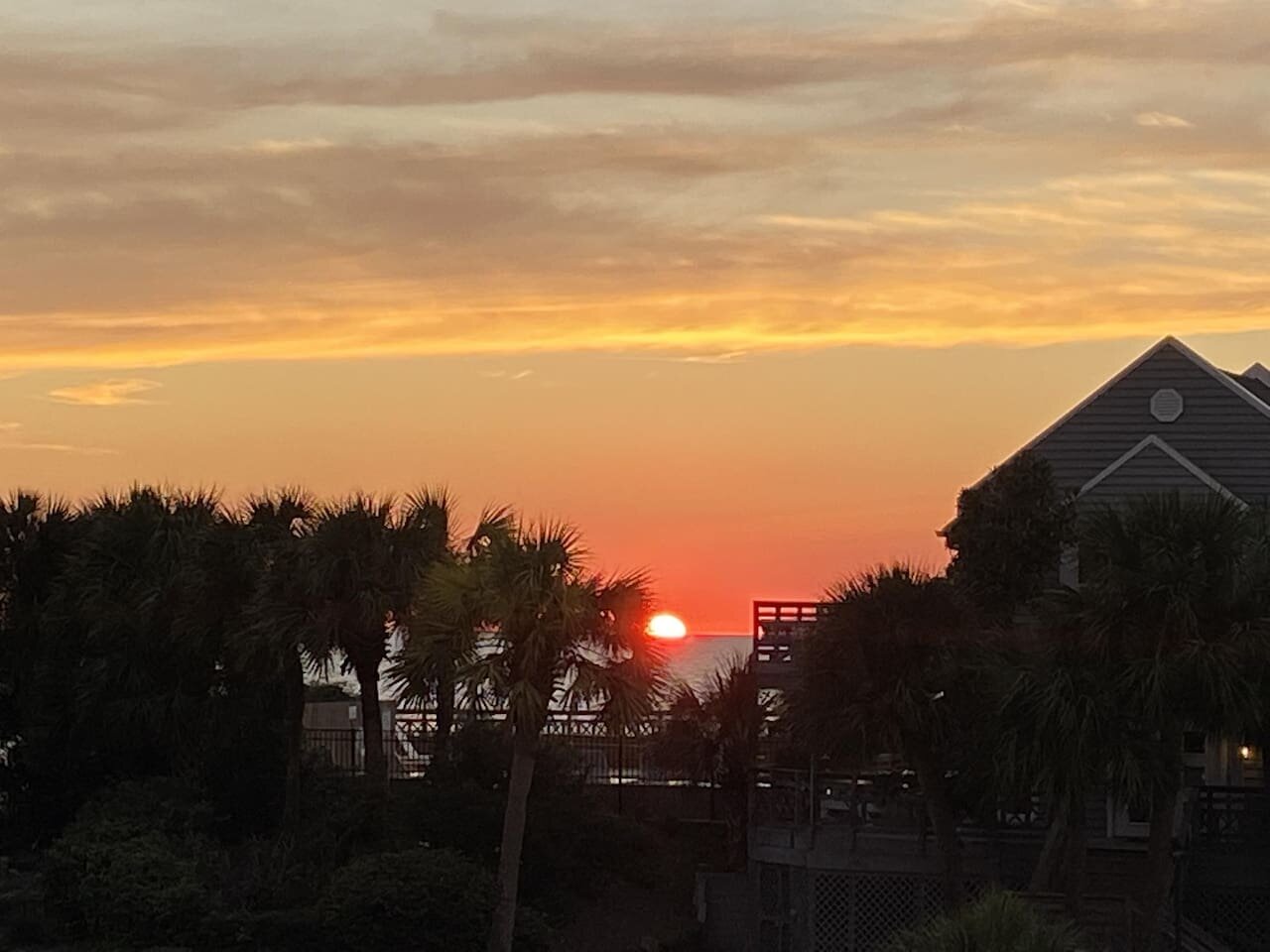 Your deck catches the color of every sunset — this one came out especially vivid, and they all feel like this.