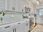 Tons of cabinet space - open cabinets for guest items!