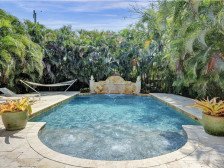 Completely private backyard with heated pool, patio, outdoor shower and hot tub.