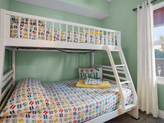 Bunk room with twin size bed on top and full-size bed on the bottom!