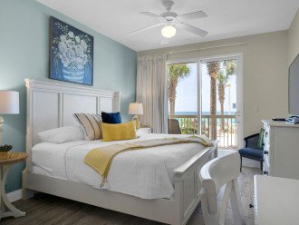 Bright yet soothing master bedroom with king size bed & private balcony access