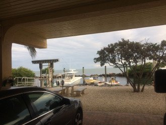 A view from your covered parking, your boat dock & fish cleaning table