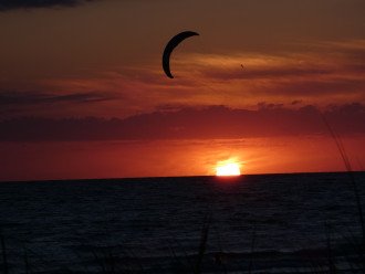 Kiteboarding at sunset.