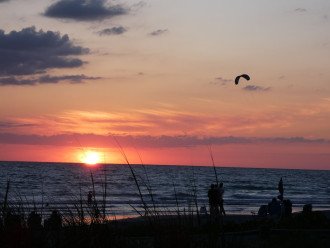 Kiteboarding at sunset