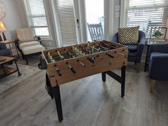 Play foosball in the gaming area