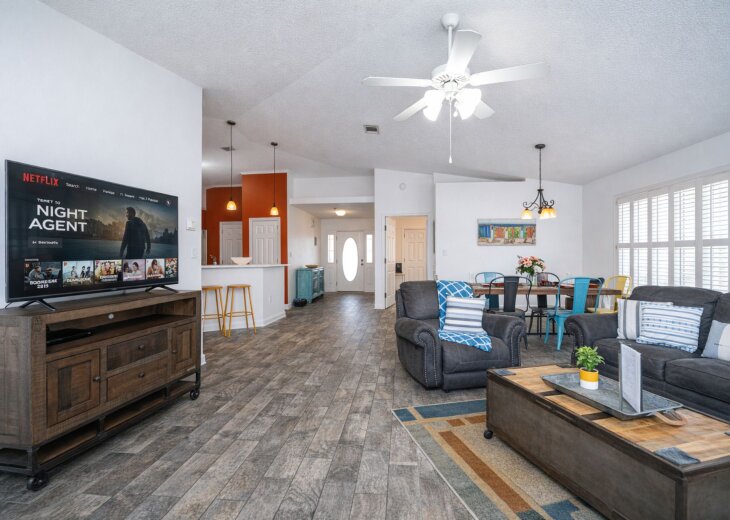 Living Room: Sun-soaked space with vibrant decor, perfect for relaxation and fun gatherings!