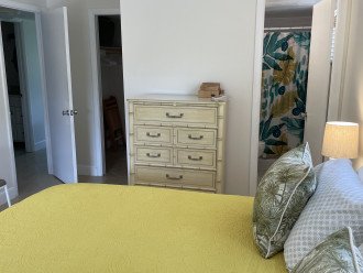 Primary bedroom with bathroom and walk in closet