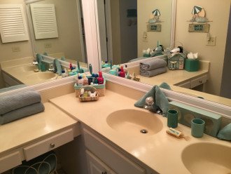 Double sinks and a make-up table, in the master dressing area