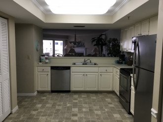 Kitchen features lots of cabinets, a huge pantry closet and newer appliances.