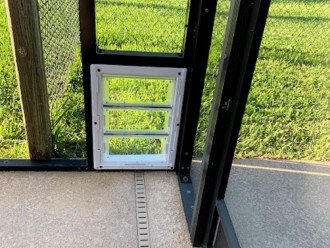 Doggie door located off the lanai, leads to fenced dog run.