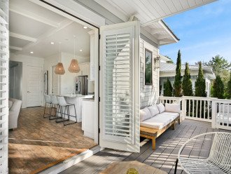 The patio door opens wide for true indoor outdoor living.