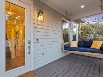 Enjoy the tropical air on the porch swing day bed, and if you're lucky you may hear the frogs sing!