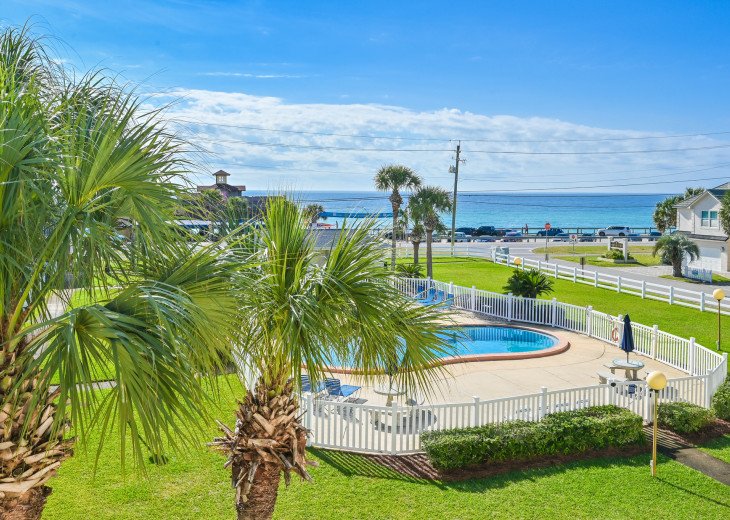 Escape to Paradise - Stunning Ocean View Patio Pool at Miramar Beach Florida Vacation Rental. Perfect for a relaxing getaway, this rental offers a front-row seat to the beautiful Floridian coast.