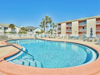 A sparkling oasis awaits the community pool, located across the street from the Gulf of Mexico. Relax in the sun, take a cool dip or lounge around on deck chairs - all just steps away from your condo.