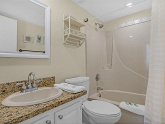 Master bath with tub/shower combination.