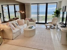 Sweeping Northwest Gulf views from this comfortable Beachfront Condo