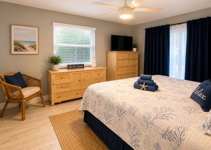Comfortable primary bedroom with king-size bed