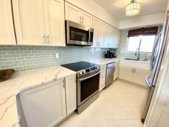 Gourmet Kitchen, quarts counter tops, stainless appliances