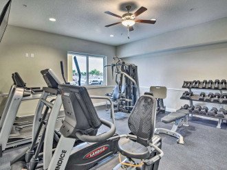 Fitness room with free weights, machine, treadmill, eliptical and rowing machine