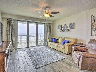 Tastfully decorated living room, with faux wood ceramic tile and amazing views!