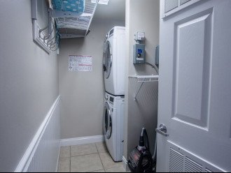 The laundry room is equipped with full size, front load, LG Washer & Dryer