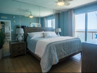The Bedroom with it'sKing Bed right next to the ocean! Opens onto the balcony