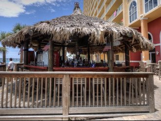 The Tiki bar is located between the east & west pools